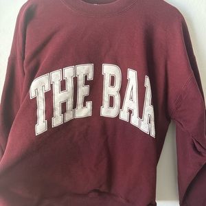 Maroon Sweatshirt with Bold White Lettering